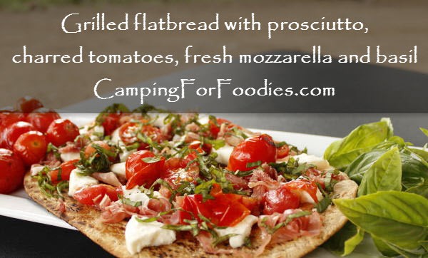 Grilled flatbread with prosciutto, charred tomatoes, fresh mozzarella and basil - Camping For Foodies .com