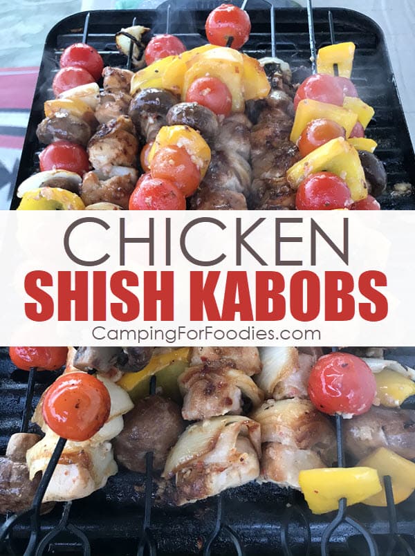 Chicken Shish Kabobs by CampingForFoodies features skewers of grilled chicken and vegetables including charred cherry tomatoes, yellow bell peppers and mushrooms sitting on a propane camping grill ready to be served at the campsite with text over the image that reads chicken shish kabobs.