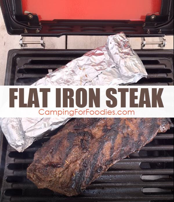 Simple Camping Recipe Grilled Flat Iron Steak by CampingForFoodies features flat iron steak that has just finished cooking and is sitting on a propane camp grill with a side dish foil packet alongside, both are ready to be removed from the grill to be served at the campsite with text over the image that reads flat iron steak.