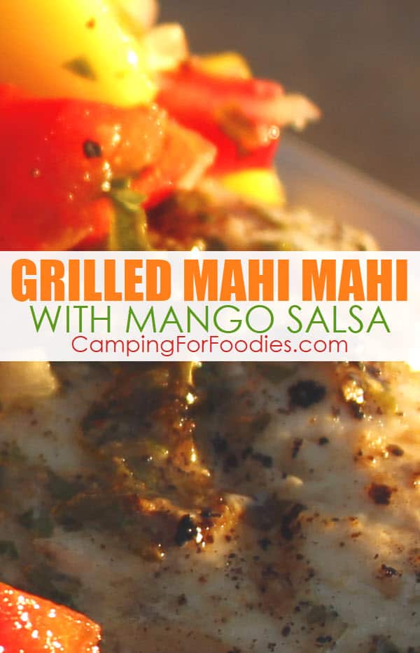 Grilled Mahi Mahi Recipe With Mango Salsa by CampingForFoodies features a marinated and grilled piece of Mahi Mahi topped with fresh mango salsa made from mangos, red onion, red bell pepper and cilantro with text over the image that reads grilled mahi mahi with mango salsa.