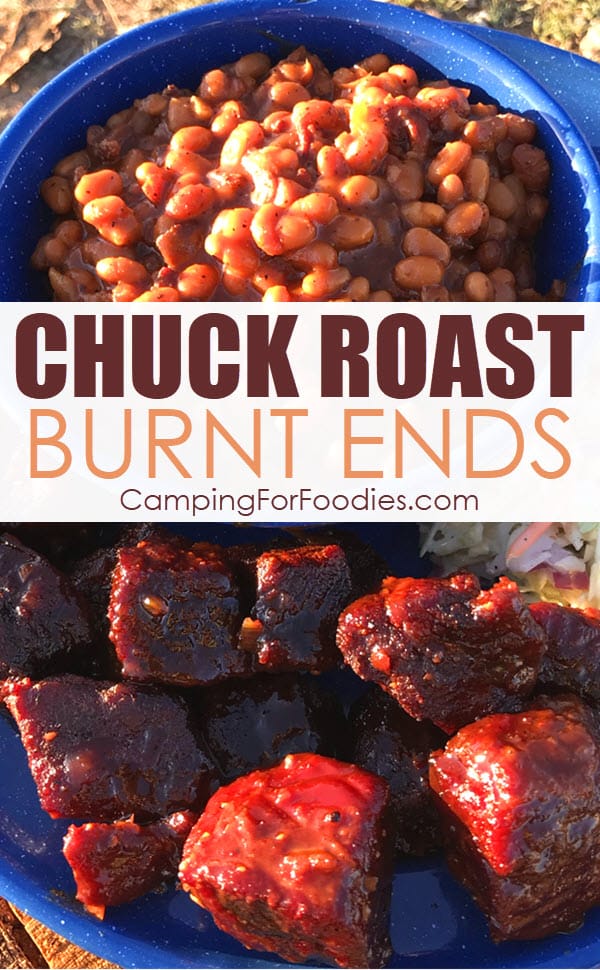 Chuck Roast Burnt Ends Poor Man’s Brisket Recipe by CampingForFoodies features a blue camping plate and bowl filled with food including BBQ sauce covered burnt ends made from beef chuck roast with a side of baked beans and coleslaw with text over the image that reads chuck roast burnt ends.