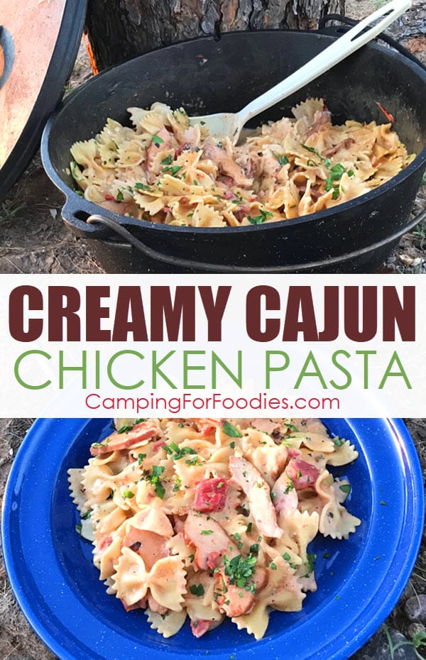 Creamy Cajun Chicken Pasta One Pot Dutch Oven Camping Recipe by CampingForFoodies features a blue camping dinner plate filled with bowtie pasta and sliced chicken in a creamy Cajun sauce sitting in front of a cast iron camp Dutch oven with more of the pasta recipe and serving spoon next to the Dutch oven lid that is leaning against a log for the campfire with text over the image that reads Creamy Cajun Chicken Pasta.