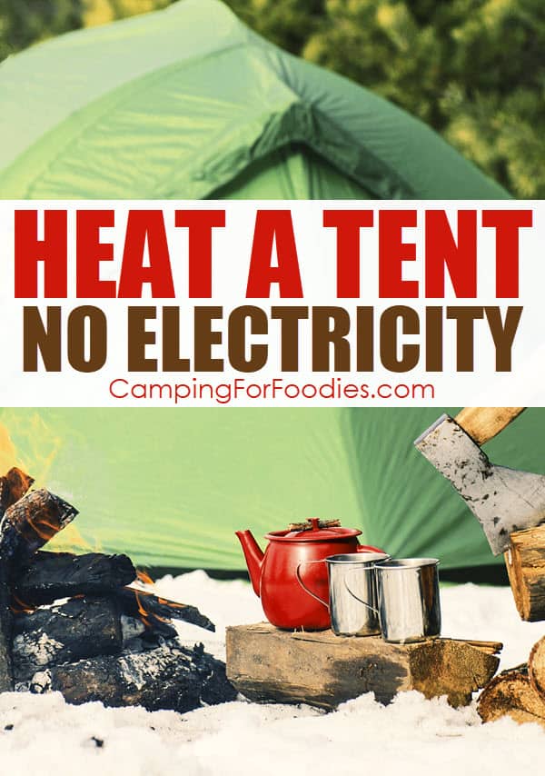 How To Heat A Tent Without Electricity by CampingForFoodies features a green tent on the floor of a snow-covered forest campsite with a campfire burning and a pot with two coffee mugs set on a piece of firewood next to an axe with text over the image that reads Heat A Tent, No Electricity.