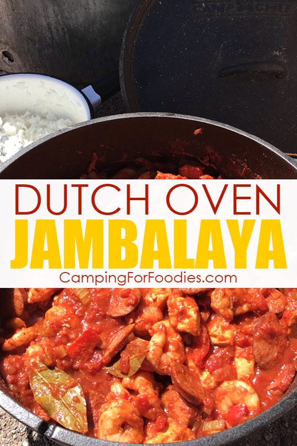 Dutch Oven Jambalaya by CampingForFoodies features a cast iron camping Dutch oven filled with chicken, sausage and shrimp jambalaya alongside a pot of white rice in the background and a cast iron lid resting against a camping fire ring with text over the image that reads Dutch Oven Jambalaya.